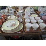 Two trays of gilded porcelain teaware hand painted by E.F Nelson with flowers and foliage. (2) (B.P.