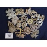 Bag of assorted British military cap badges, various to include; Tank Corps, RAF, South Lancashires,