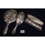 Group of mixed silver backed dressing table items to include; matching cherub design hand mirror and