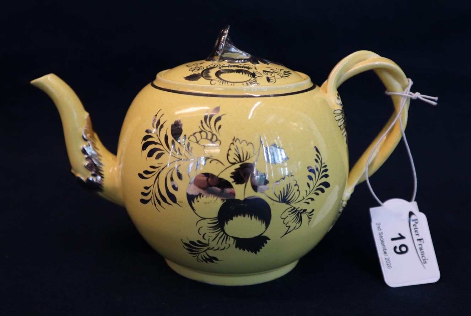 18th Century canary yellow silver resist baluster teapot with entwined handle and floral finial,