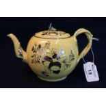 18th Century canary yellow silver resist baluster teapot with entwined handle and floral finial,