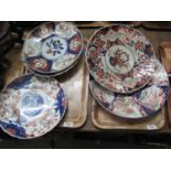 Five Japanese Imari chargers, one with panels and fo dogs and birds. (5) (B.P. 21% + VAT)