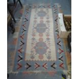 20th Century Kelim runner on a cream and blue ground with stylised decoration.Possibly Greek (B.P.