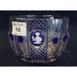 A late 19th Century heavy glass finger bowl, probably Bohemian, decorated with blue glass overlay