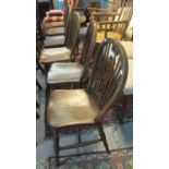Set of six elm wheel, spindle and hoop back kitchen chairs. (6) (B.P. 21% + VAT)