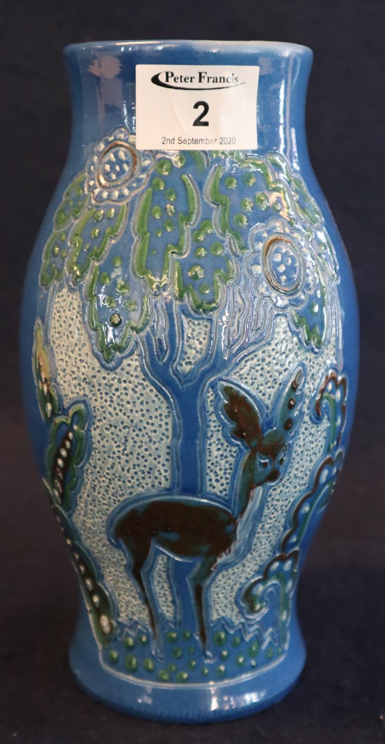 C.H. Brannam pottery Barnstaple Art Deco baluster pottery vase, overall decorated with stylised deer