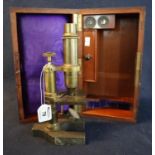 19th Century monocular brass microscope in fitted mahogany box containing two seperate oculars. (B.