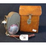 Bell & Howell-Gaumont 'Sportster' mechanical cine camera in leather carrying case with shoulder