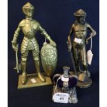 Diecast metal crown with opening mechanism, a cast brass fireside figure of a knight with shield and