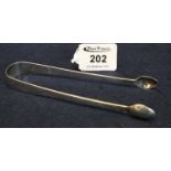 Pair of Georgian silver sugar tongs with bright cut engraved decoration. London hallmarks, 1 troy oz