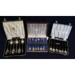 Three cased sets of silver tea and coffee spoons to include; cased set of six coffee bean spoons