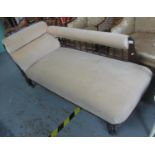 Edwardian mahogany framed upholstered chaise longue on ring turned legs and casters. (B.P. 21% +