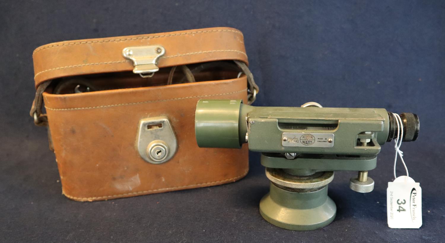 A Hilger & Watts English made surveyors level or theodolite in original simulated leather case. 18cm