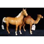 Beswick palomino horse with printed marks to base, together with a Beswick camel. (2) (B.P. 21% +