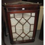 Georgian oak hanging corner cupboard with single astragal glazed door and three shaped shelves to