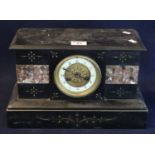 Late 19th Century black slate and marble architectural two train mantel clock, with brass drum