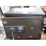 Cock steel floor safe with combination and key lock. 48 x 40 x 38cm approx. (B.P. 21% + VAT) good