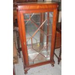 Mahogany single door glazed china display cabinet with astragal glazing bars and glass shelves on