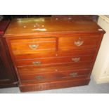 Edwardian satin walnut chest of two short and two long drawers on a platform base. Originally a