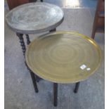 Two Middle Eastern design brass top folding tables, together with a brass tray. (B.P. 21% + VAT)