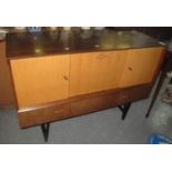 Retro"Beautility" dining room furniture sideboard on ebonised tapering legs. (B.P. 21% + VAT)