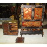 Two Japanese lacquered and marquetry inlaid table cabinets with drawers and cupboards, one with