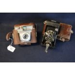 Kodak T1 Coronet folding bellows type camera in leather case, together with a Koroll II viewfinder