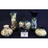 Five modern Moorcroft art pottery tube lined vases of squat, baluster and waisted form, decorated