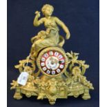 19th Century French gilded spelter figural mantel clock with painted ceramic face and brass drum