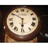 Early 20th Century oak school type wall clock, the Roman face marked W.J Thomas, Llanelly, drum type