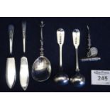 Odd silver cutlery items to include; two Georgian silver salt spoons, silver propelling pencil and