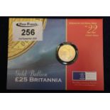 Queen Elizabeth II gold £25 Britannia coin, year 2000 in Royal Mint mount. Declared weight 8.5g