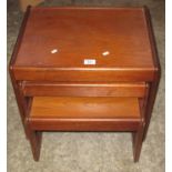 A modern teak nest of three rectangular tables. (B.P. 21% + VAT)