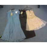 Three vintage dresses to include; a hand made pale pink party dress with tulle skirt, a blue 40's/