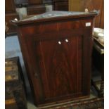 19th Century mahogany parquetry inlaid blind panelled single corner hanging cupboard. (B.P. 21% +