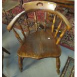 Early 20th Century elm smokers bow chair. (B.P. 21% + VAT)