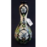 Moorcroft art pottery tube lined 'Centaurer' vase in original box. 24cm high approx, impressed and