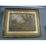 Late 19th/early 20th Century oils on canvas, deer in a woodland with lake, unsigned, in gilt slip
