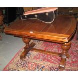 Early 20th Century oak draw leaf dining table on fluted supports and stretchers. (B.P. 21% + VAT)