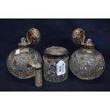 Pair of Edwardian globular hob nail cut scent bottles with silver tops and stoppers. Together with a