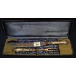 Edwardian silver handled repousse two piece carving set, London hallmarks, in fitted case. (B.P. 21%