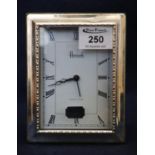 Modern Harrods Knightsbridge sterling silver clock. The frame silver, in original box. (B.P. 21% +