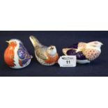 Three Royal Crown Derby paperweights of a robin and two other birds, all with gold stoppers. (3) (