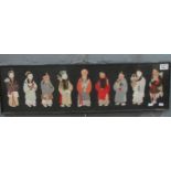 A framed group of applique Chinese figures various, together with a framed watercolour study of a