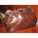 Early 20th century leather gladstone type bag of large proportions. (B.P. 21% + VAT)