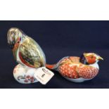 A Royal Crown Derby bone china pheasant paperweight, together with a Royal Crown Derby bone china