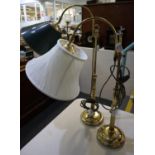 A pair of brass adjustable standard lamps with shades on fluted columns and circular base. (2) (B.P.