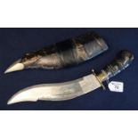 Large Kukri knife with turned handle and brass and plated mounts in leather scabbard. (B.P. 21% +