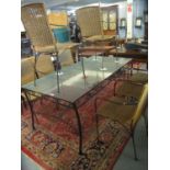 Modern glass top conservatory or garden table with a set of eight wicker armchairs. (9) (B.P.