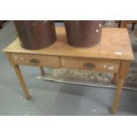 Early 20th Century pine two drawer side table on cylinder legs. (B.P. 21% + VAT)